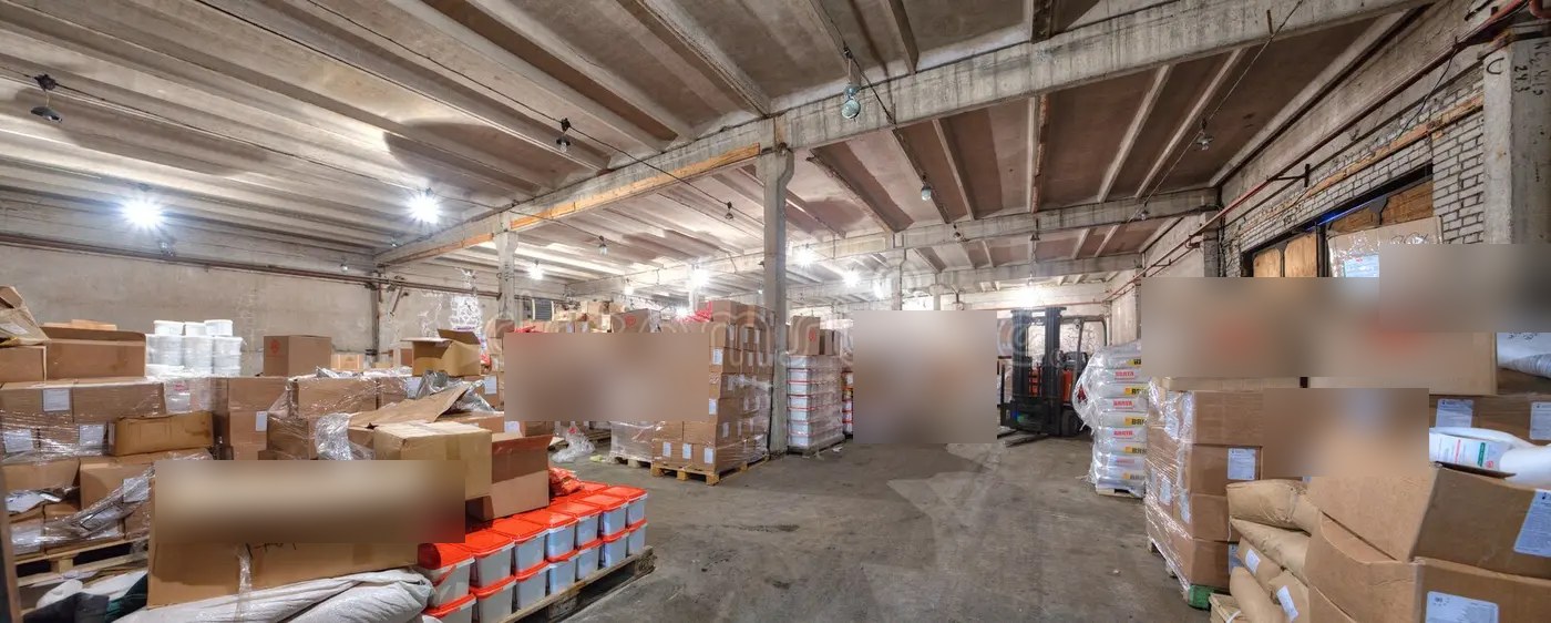 A real backroom captured by an in-store camera. What Anvista scores, on schedule.